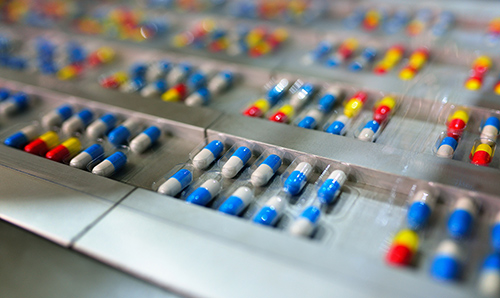 Pharmaceutical capsules on a tray